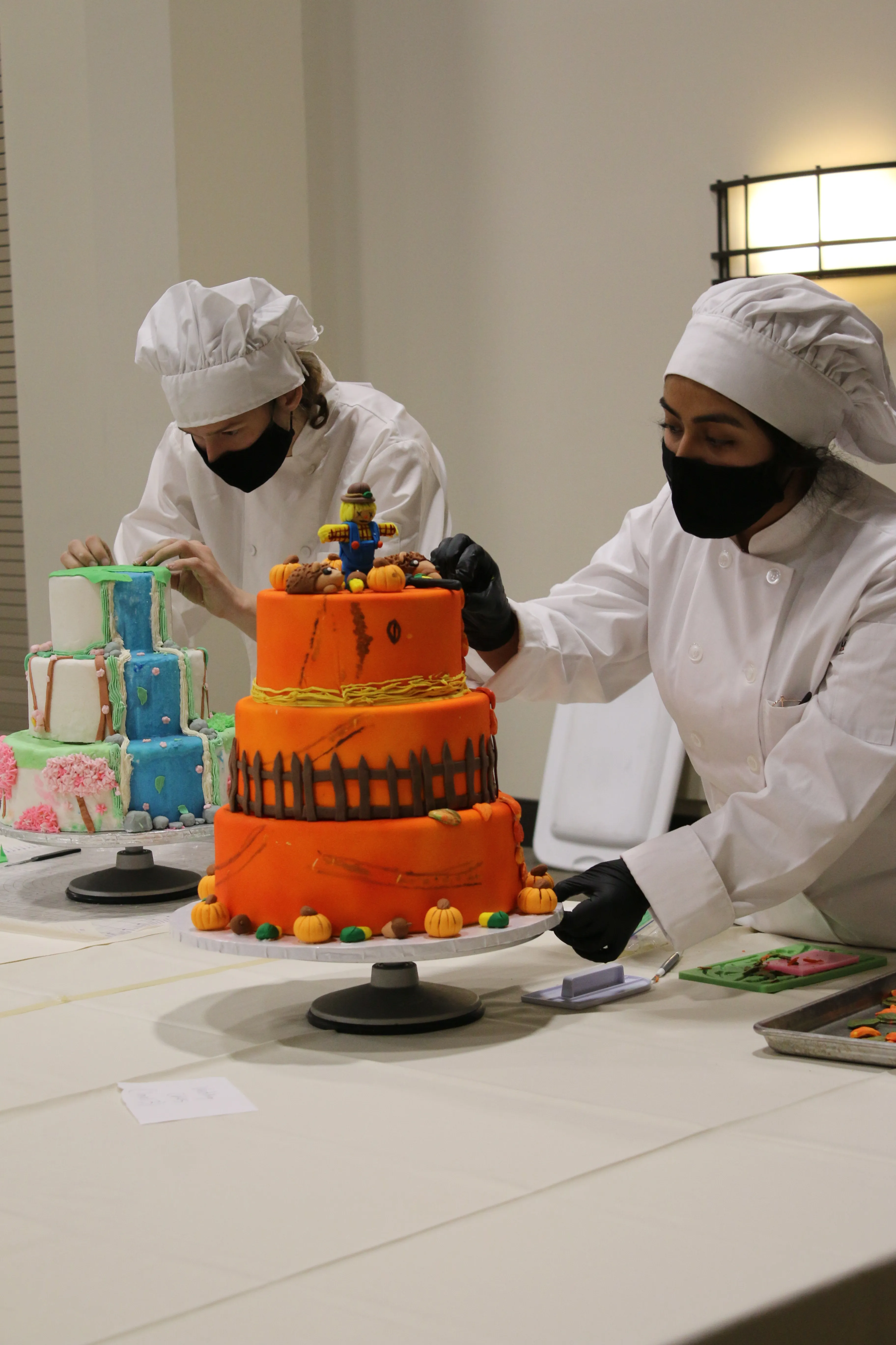 chef decorating cakes
